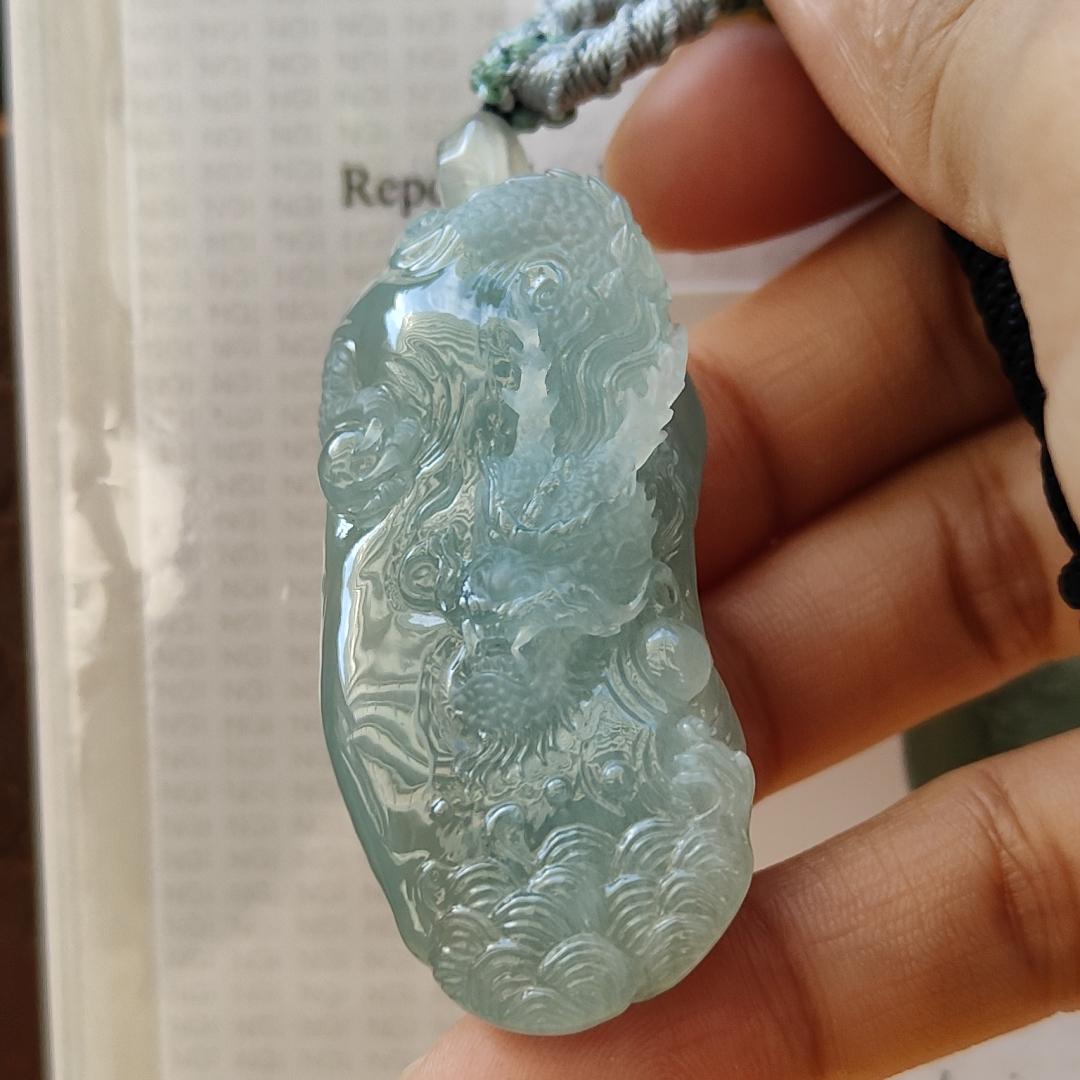 Natural Type A Jadeite Jewellery Pendant carved with dragon weighs at 30.06 grams , 50.32 * 23.30 * 12.93 mm - with Gemstone report from NGI - Very Good Translucency with faint greenish blue (pendant140)