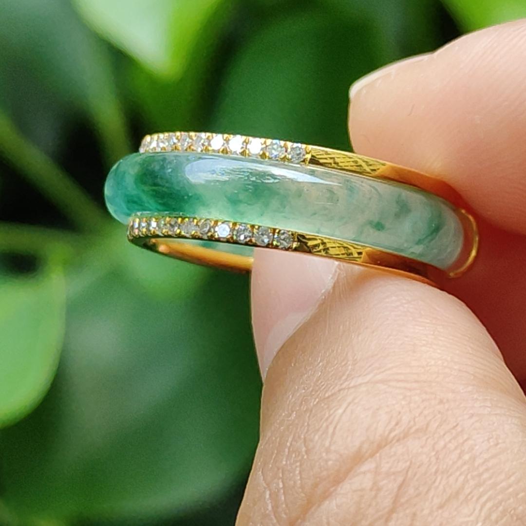 Icy Translucent Green Floating Patches Natural Type A Jadeite Jade crafted as Ring designed with removable 18k Gold, certificate weighs 4.65 grams, measurement 6.3 * 2.9 mm, finger size 17.1 mm (18kring29)