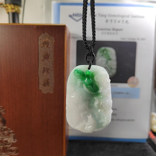 Carved with lotus fish Natural Type A Jadeite Pendant with Gemstone report from NGI - Weight 240.59 grams Measurement: 54.17 * 36.35 * 13.36 mm - Translucent with the Specify Gravity at 3.33 , Near white to faint green with green patches (pendant145)