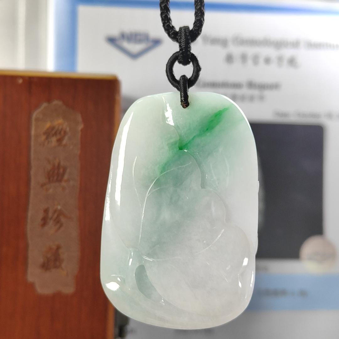 Carved with lotus fish Natural Type A Jadeite Pendant with Gemstone report from NGI - Weight 240.59 grams Measurement: 54.17 * 36.35 * 13.36 mm - Translucent with the Specify Gravity at 3.33 , Near white to faint green with green patches (pendant145)