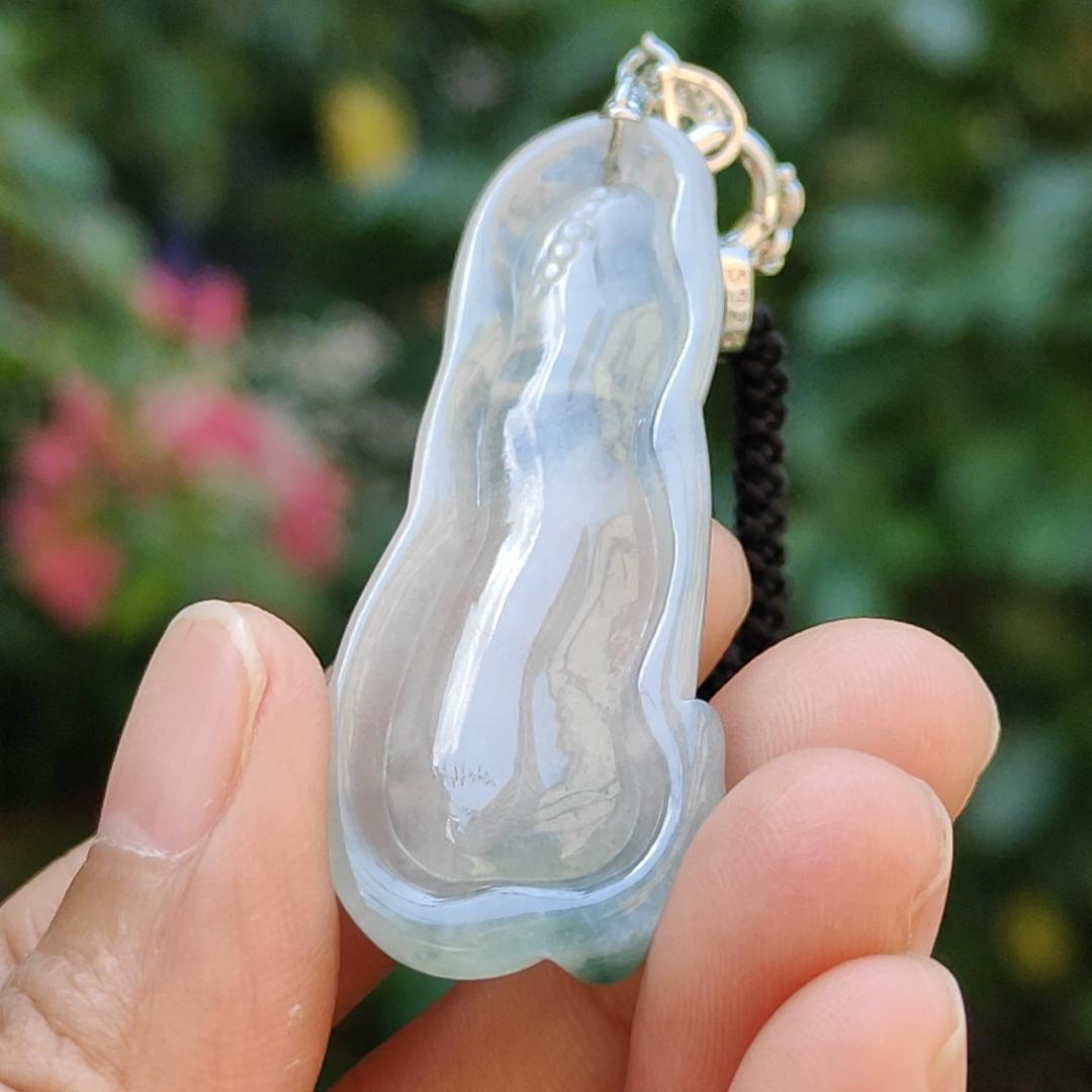 Icy variety Translucent with green Natural Type A Jadeite Pendant Necklace crafted as the faceless buddha with symbols of Holy and blessed blessings of wealth, prosperity and happiness with certificate weigh 11.02 grams, 49.9 * 19.9 * 7 mm (pendant34)