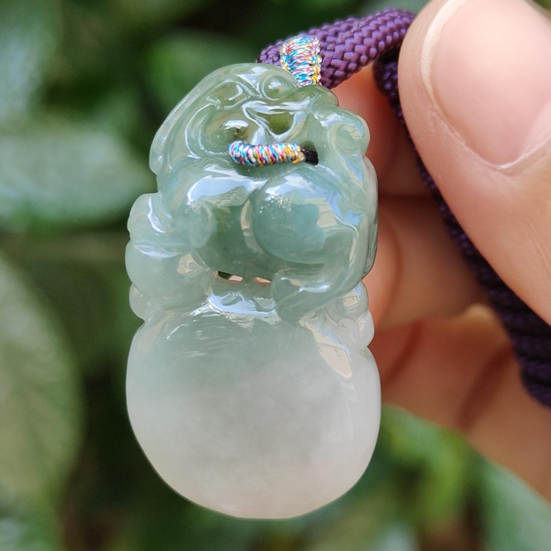 Light Green Natural Type A Jadeite Jade crafted with Lion as Pendant certificate weighs 14.94 grams, measurement 36.6 * 20.5 * 10.8 mm (pendant249)