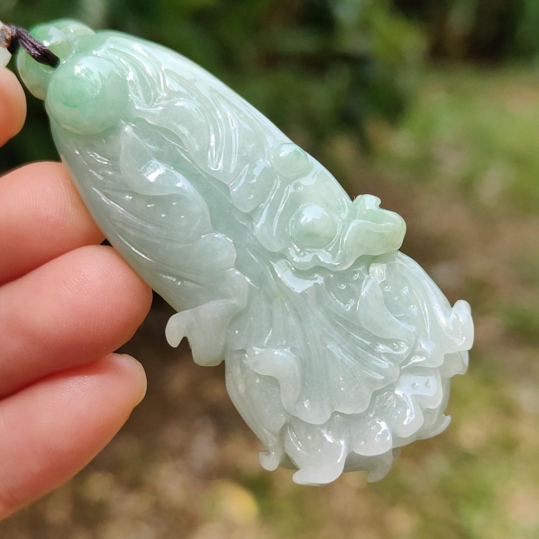 Good Quality Light Green Natural Type A Jadeite Jade crafted as Cabbage symbols of Lucks with Money as Pendant, certificate weighs 36.65 grams, measurement 62.5 * 28.6 * 13.1 mm (pendant267)