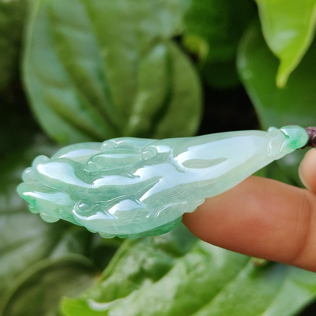 Very Beautiful Finger Citron Natural Type A Jadeite pendant jewelry  with NGI Gemstone report weight 76.79 grams 52.83 * 24.26 * 9.38 mm - Highly Translucent very fine grain with patches of light green suffused to a paler ground (pendant151)