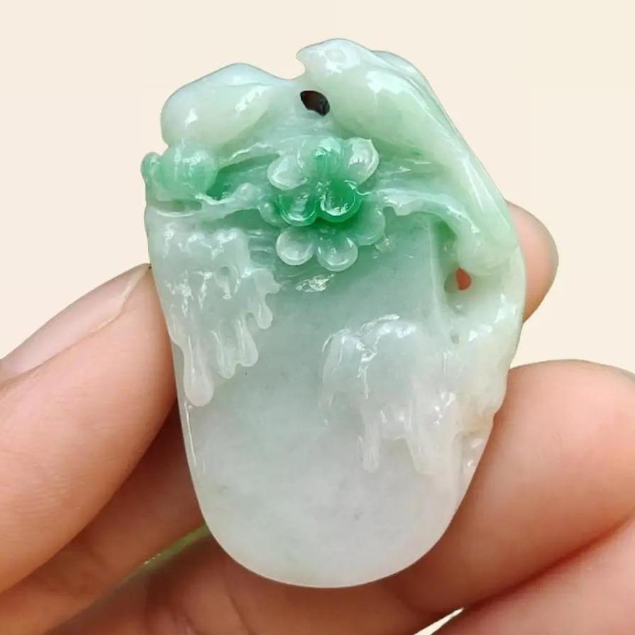 Beautifully crafted with birds and flower light green Natural Type A Jadeite Jade as Pendant, certificate weighs 18.63 grams, measurement 38.3 * 25.9 * 9.6 (pendant247)