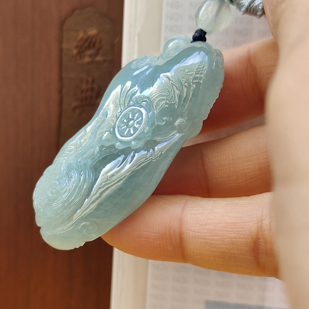 Natural Type A Jadeite Jewellery Pendant carved with dragon weighs at 30.06 grams , 50.32 * 23.30 * 12.93 mm - with Gemstone report from NGI - Very Good Translucency with faint greenish blue (pendant140)