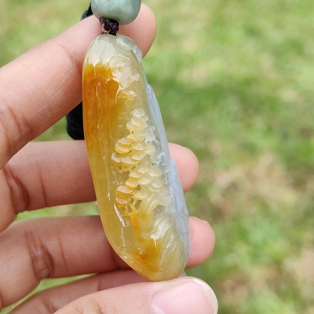 Beautifully crafted with sceneries on Yellow Natural Type A Jadeite Jade as a Pendant Necklace with certificate weigh 27.75 grams, measurement 52.1 * 25.7 * 12.7 mm (pendant206)