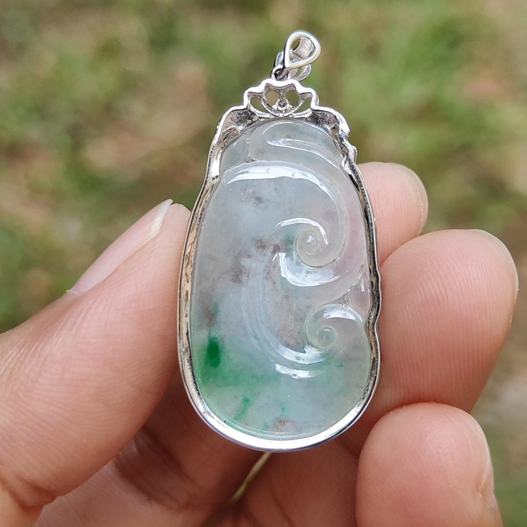 Icy Translucent with Light Green Patches Natural Type A Jadeite Jade crafted with shape of Ruyi set on 18k Gold as Pendant, certificate weighs 4.01 grams, measurement 37.6 * 18 * 5.5 mm (18kp51)