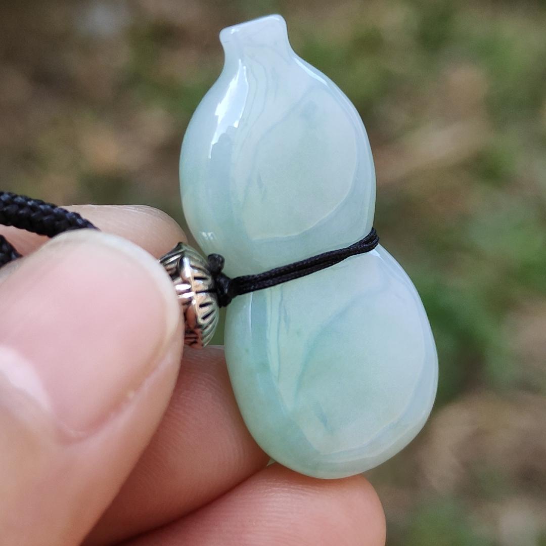 Light Green Natural Type A Jadeite Jade crafted with shape of Gourd as Pendant, certificate weighs 8.42 grams, measurement 32.9 * 16 * 8.4 mm(pendant252)