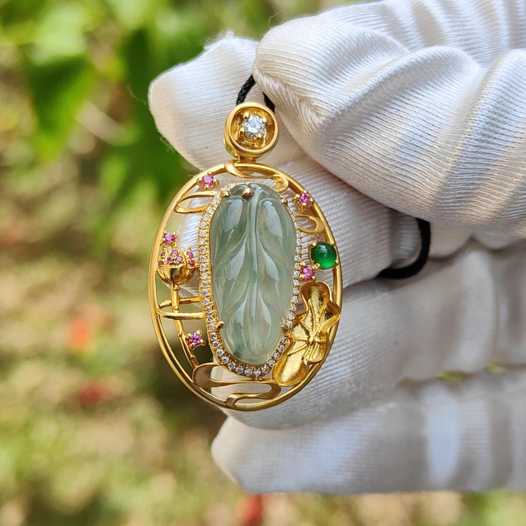 Premium Quality Icy light green with patches Natural Type A Jadeite Jade crafted as Leaf set on 18k Gold with 1 Green Cabochon and Diamonds, Certificate included weigh 4.36 grams, Measurement 35.3 * 22 * 8.2 mm (18kp25)