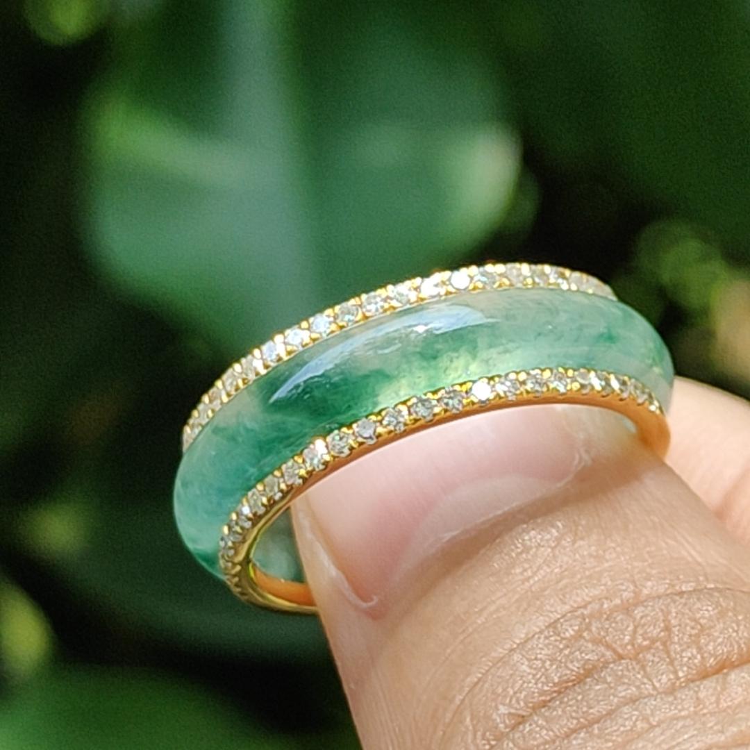 Icy Translucent Green Floating Patches Natural Type A Jadeite Jade crafted as Ring designed with removable 18k Gold, certificate weighs 4.65 grams, measurement 6.3 * 2.9 mm, finger size 17.1 mm (18kring29)