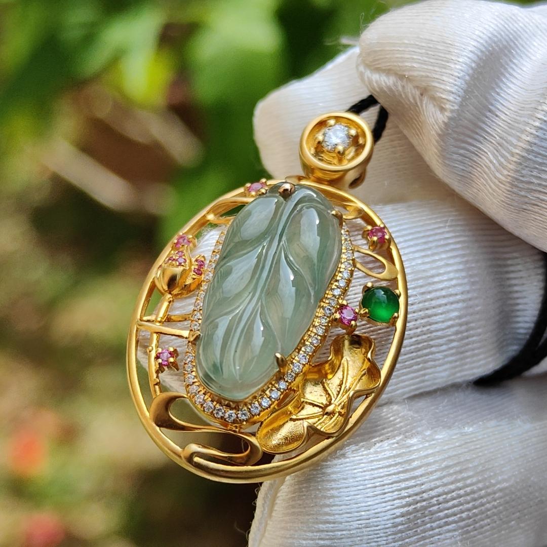 Premium Quality Icy light green with patches Natural Type A Jadeite Jade crafted as Leaf set on 18k Gold with 1 Green Cabochon and Diamonds, Certificate included weigh 4.36 grams, Measurement 35.3 * 22 * 8.2 mm (18kp25)