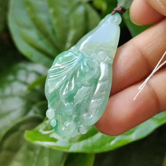 Very Beautiful Finger Citron Natural Type A Jadeite pendant jewelry  with NGI Gemstone report weight 76.79 grams 52.83 * 24.26 * 9.38 mm - Highly Translucent very fine grain with patches of light green suffused to a paler ground (pendant151)