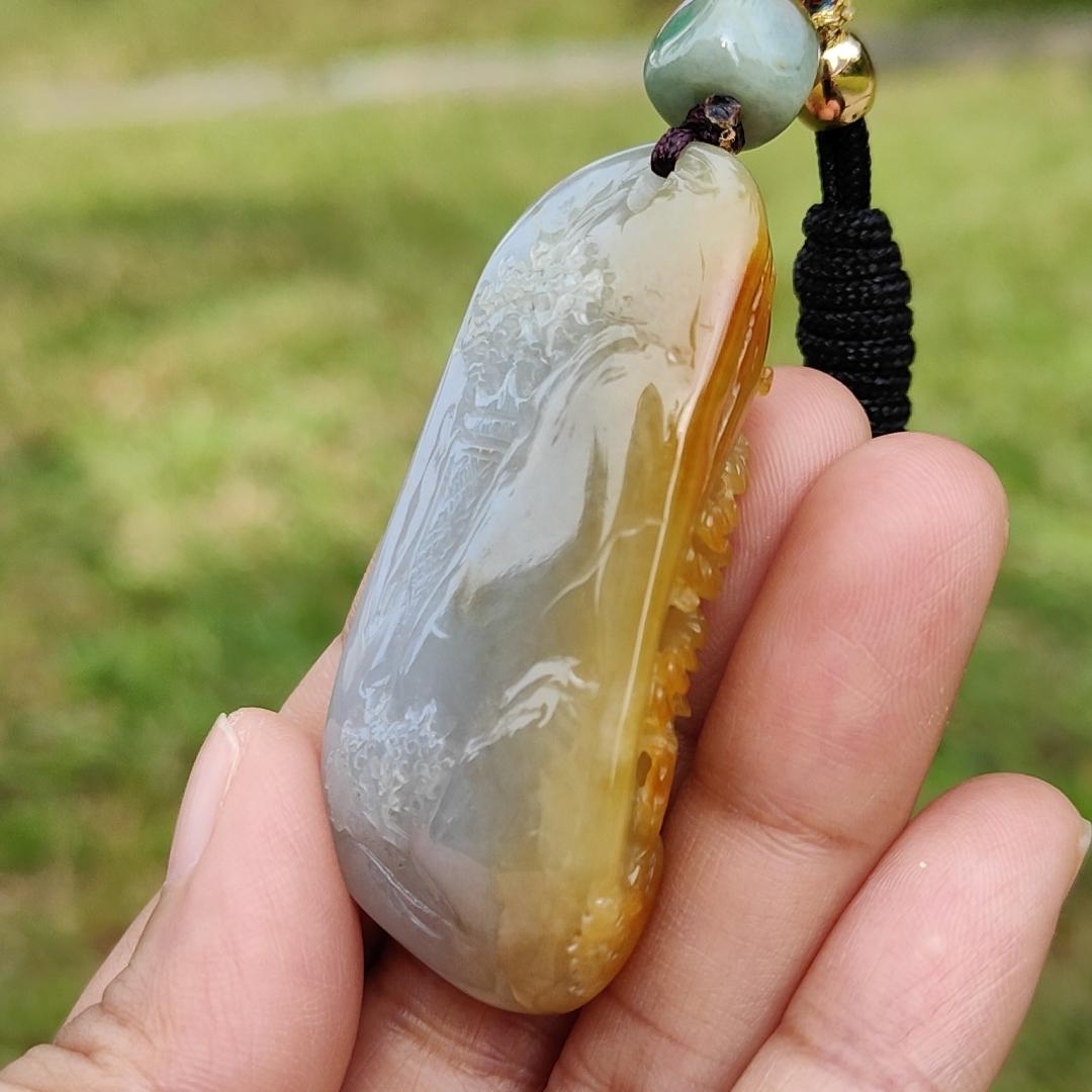 Beautifully crafted with sceneries on Yellow Natural Type A Jadeite Jade as a Pendant Necklace with certificate weigh 27.75 grams, measurement 52.1 * 25.7 * 12.7 mm (pendant206)