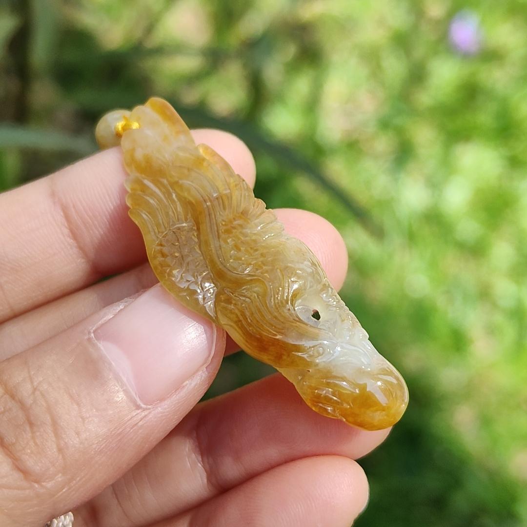 Yellow Natural Type A Jadeite crafted with Eagle and Chinese Coins symbols of Winner, Money and Luck, with GIC labs Approved certificate weigh 8.21 grams, 49.8 * 15.5 * 8.1 mm, very suitable for daily wear