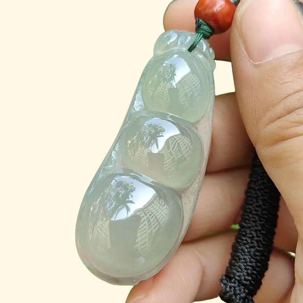 Premium Quality Icy Translucent Green Hue crafted as French Bean Natural Type A Jadeite Jade as Pendant, certificate weighs 12.37 grams, measurement 49.9 * 20 * 7.6 mm (pendant297)