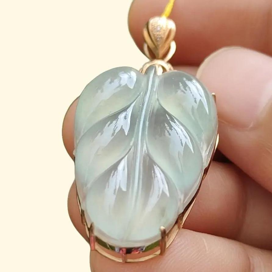 Premium Quality Icy Translucent Light Green Hue Natural Type A Jadeite Jade crafted as Leaf set on 18k Gold as Pendant, certificate weighs 5.07 grams, measurement 40.5 * 18 * 7.5 mm (18kp42)