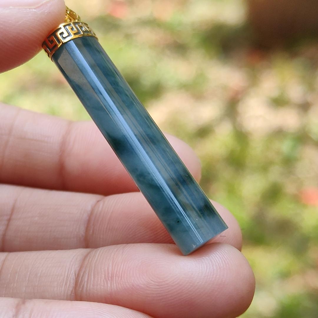 Dark Bluish Green Natural Type A Jadeite Jade crafter with a shape of Cylinder set with 18k gold clasp as Pendant, certificate included weigh 6.49 grams, measurement 37.6 * 9.6 * 6.3 mm (18kp28)