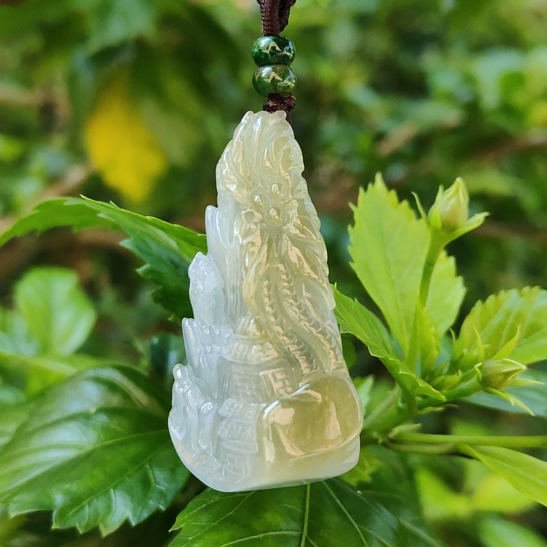 Very Unique and Rare Light Purple with Yellow Natural Type A Jadeite Pendant Crafted with waterfall, moutain, houses and coconut trees, symbols of money, power of life, Extend upwards with certificate weigh 31.55 grams, 49 * 32.3 * 13.5 mm, (pendant70)