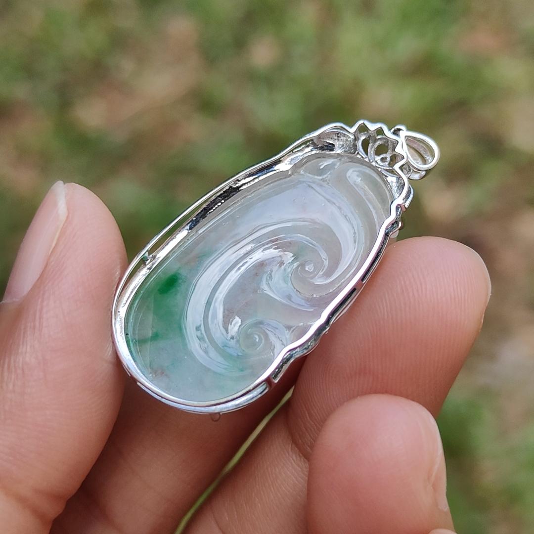 Icy Translucent with Light Green Patches Natural Type A Jadeite Jade crafted with shape of Ruyi set on 18k Gold as Pendant, certificate weighs 4.01 grams, measurement 37.6 * 18 * 5.5 mm (18kp51)