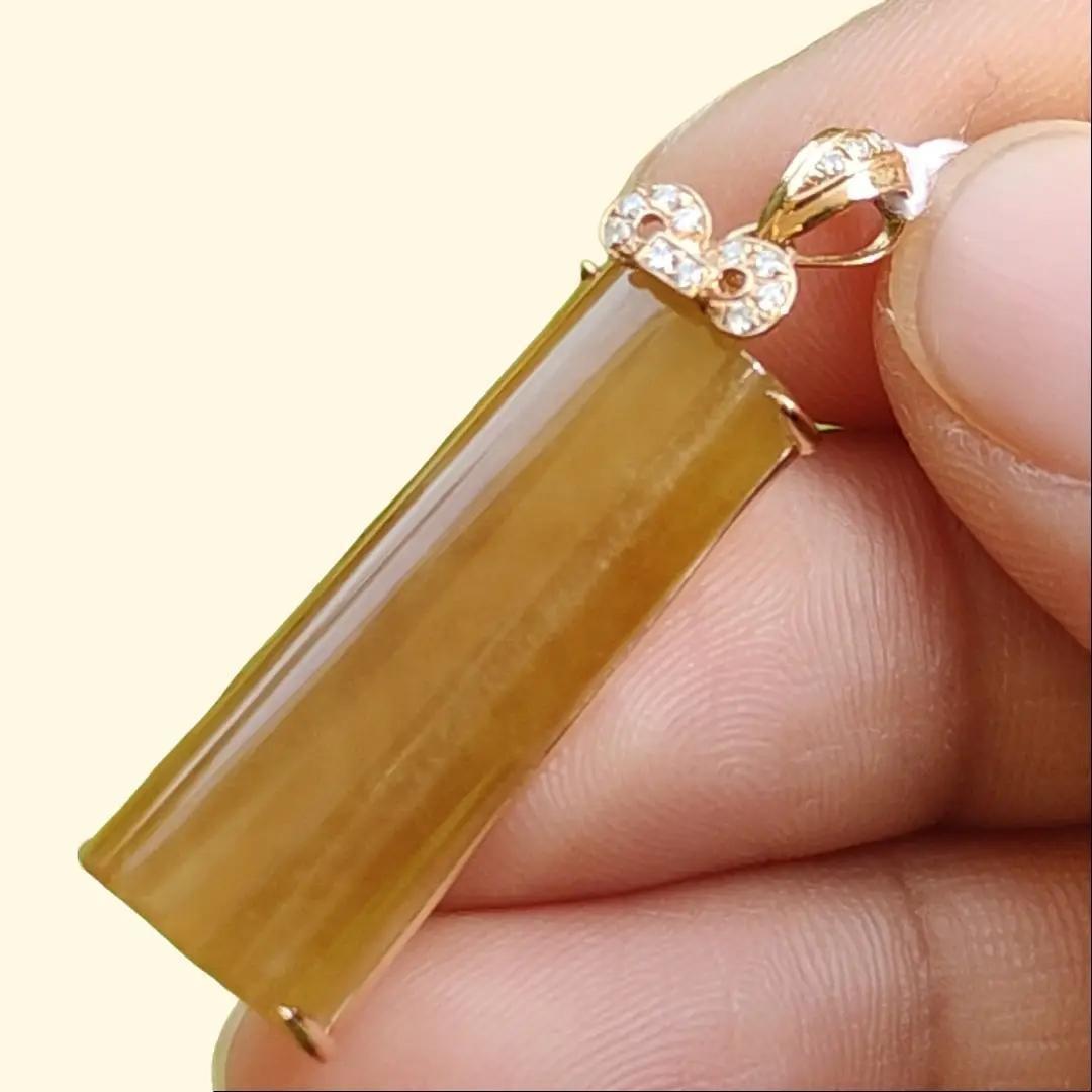 High Quality Brownish Yellow Natural Type A Jadeite Jade crafted as Nothing set on 18k Gold as Pendant, certificate weighs 4.49 grams, measurement 35 * 10.2 * 6.2 mm (18kp59)