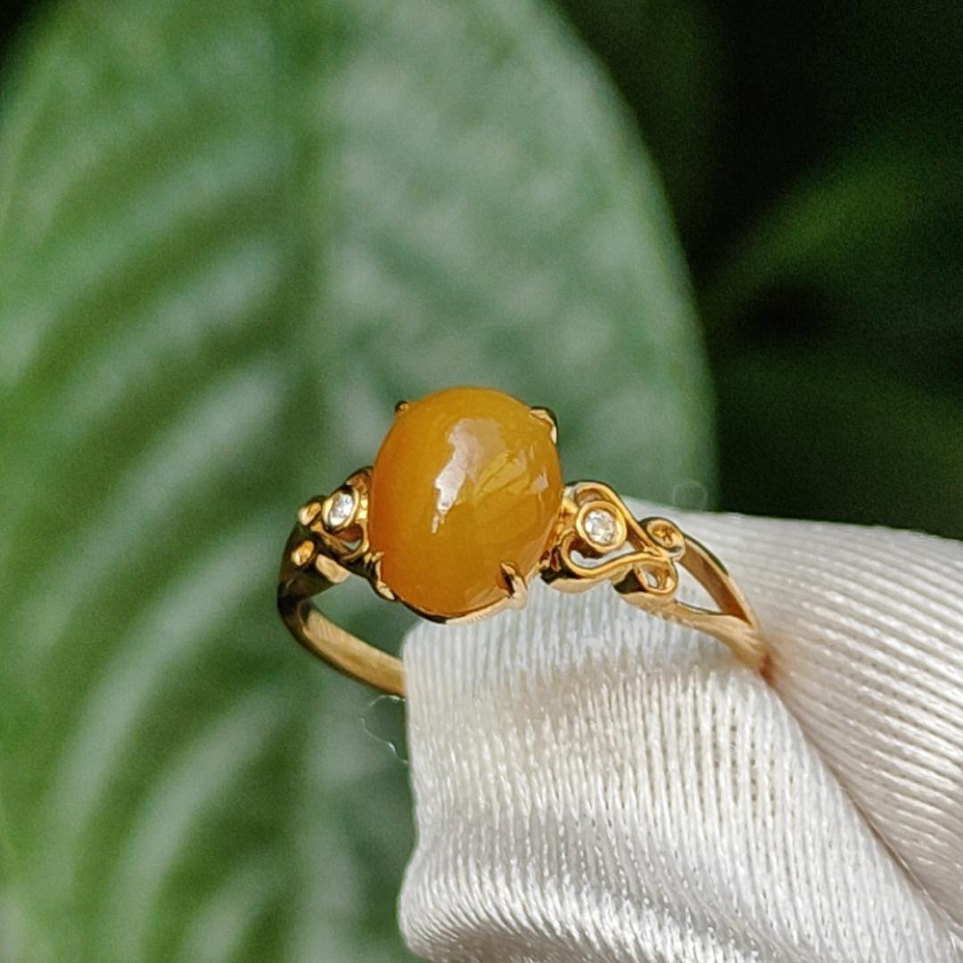 Yellow with a bit reddish Natural Type A Jadeite Jade Cabochon 8.6 * 7 * 3.6 mm set on 18k Gold as Ring adding 2 diamonds with certificate weigh 2.08 grams, finger size 16.8 mm (18kring13)