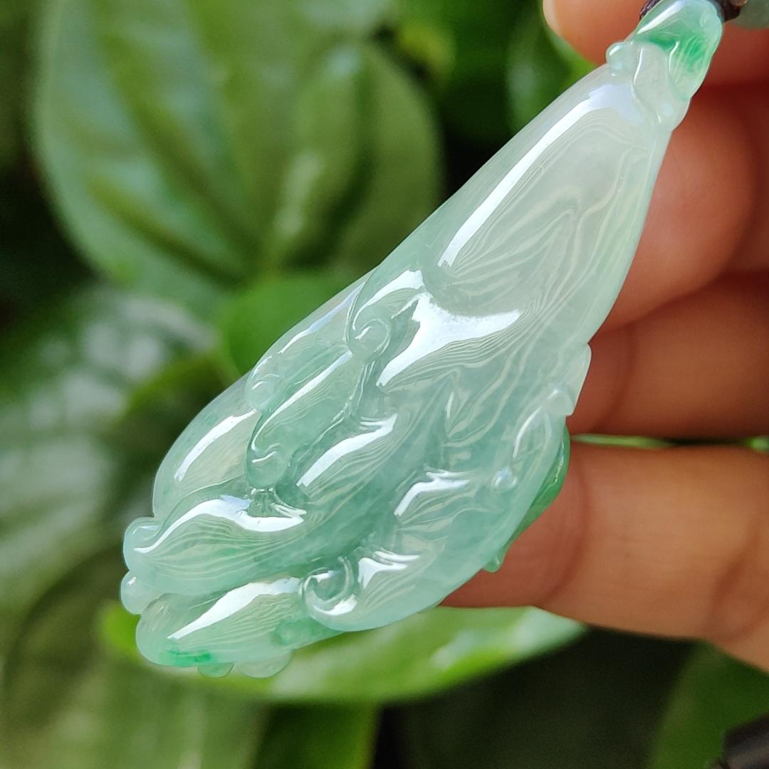 Very Beautiful Finger Citron Natural Type A Jadeite pendant jewelry  with NGI Gemstone report weight 76.79 grams 52.83 * 24.26 * 9.38 mm - Highly Translucent very fine grain with patches of light green suffused to a paler ground (pendant151)