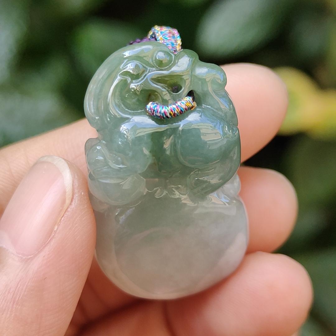 Light Green Natural Type A Jadeite Jade crafted with Lion as Pendant certificate weighs 14.94 grams, measurement 36.6 * 20.5 * 10.8 mm (pendant249)