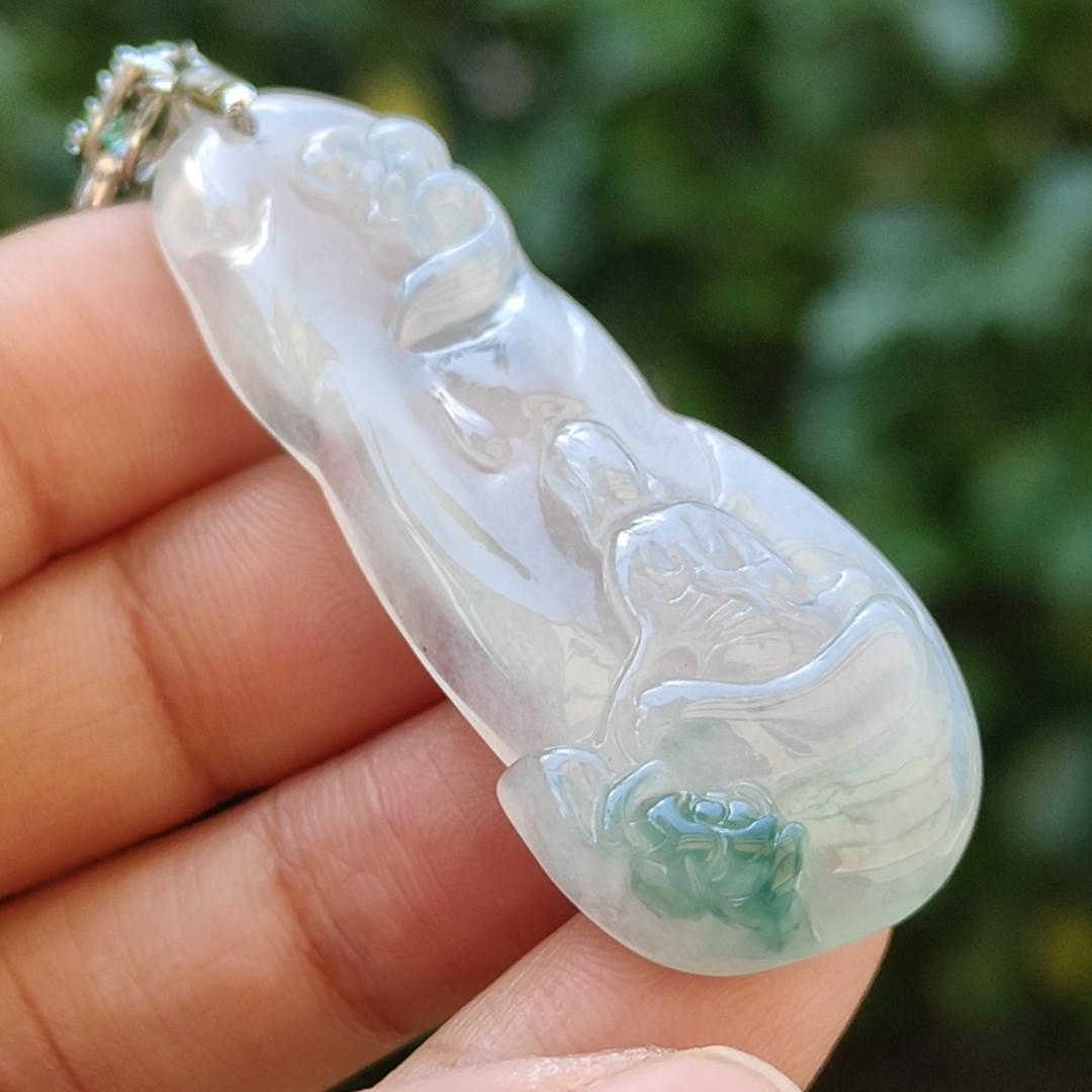 Icy variety Translucent with green Natural Type A Jadeite Pendant Necklace crafted as the faceless buddha with symbols of Holy and blessed blessings of wealth, prosperity and happiness with certificate weigh 11.02 grams, 49.9 * 19.9 * 7 mm (pendant34)