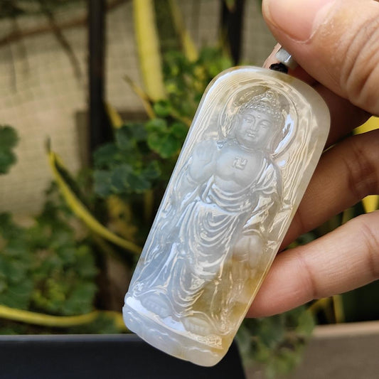 Natural Type A Jadeite Pendant with NGI Gemstone Report Crafted with Buddha near colorless with light yellowish-brown patches with good translucency , weighs 40.07 grams , 69.18 * 30.95 * 7.27 mm (pendant146)