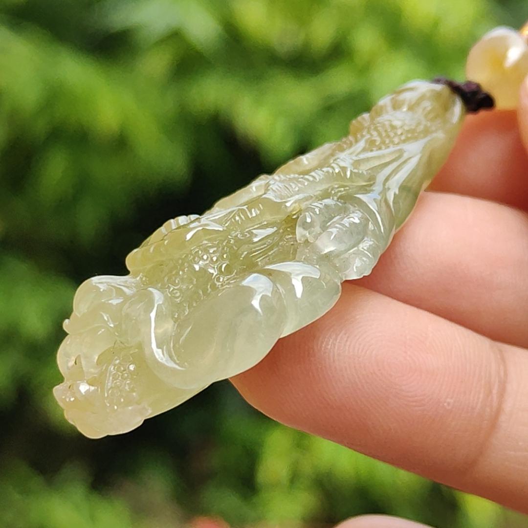 Premium Icy Yellow Natural Type A Jadeite Jade crafted with Dragon as Pendant certificate weighs 15.64 grams, measurement 50.6 * 27 * 11.5 mm (pendant253)