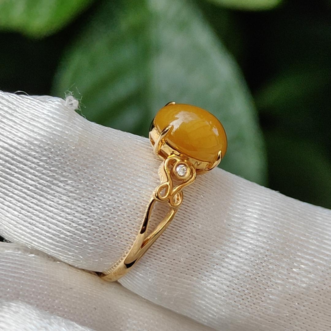 Yellow with a bit reddish Natural Type A Jadeite Jade Cabochon 8.6 * 7 * 3.6 mm set on 18k Gold as Ring adding 2 diamonds with certificate weigh 2.08 grams, finger size 16.8 mm (18kring13)