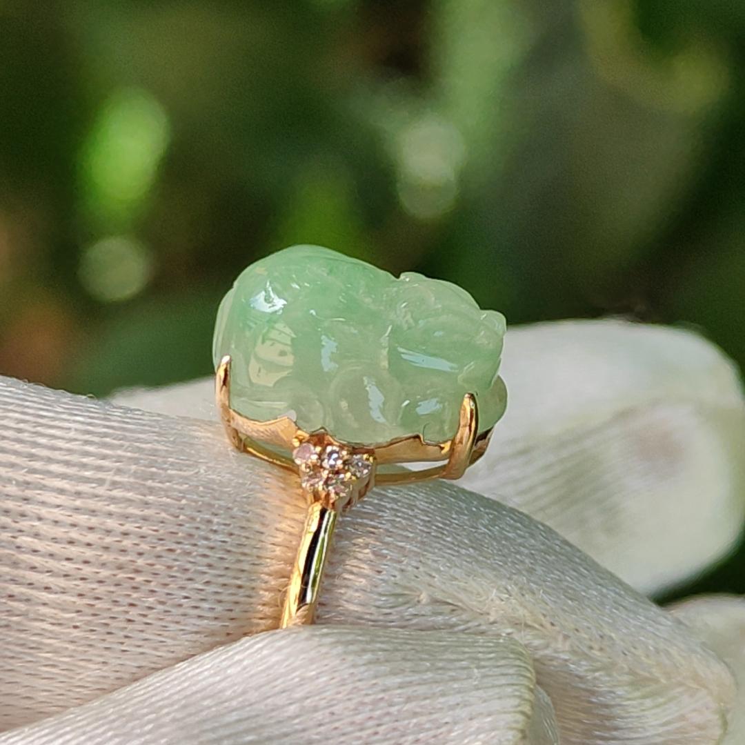 Good Quality Natural Type A Jadeite Jade crafted with light green pixiu set on 18k gold as Ring with certificate weighs 2.58 grams, measurement 12.1 * 9.6 * 5.3 mm (18kring24)