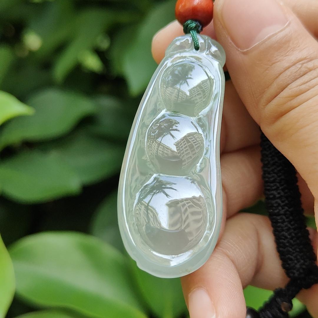 Premium Quality Icy Translucent Green Hue crafted as French Bean Natural Type A Jadeite Jade as Pendant, certificate weighs 12.37 grams, measurement 49.9 * 20 * 7.6 mm (pendant297)