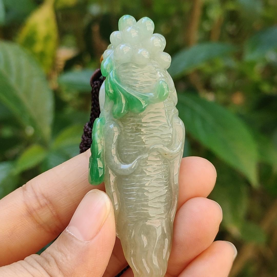 With Green and Light Green Ginseng Ruyi Natural Type A Jadeite pendant come with certificate weight 40.59 grams, 72.30 * 24.80 * 20 mm meaning Auspicious, representing good luck, happiness, joy, and wealth boosting you wearing it (pendant97)