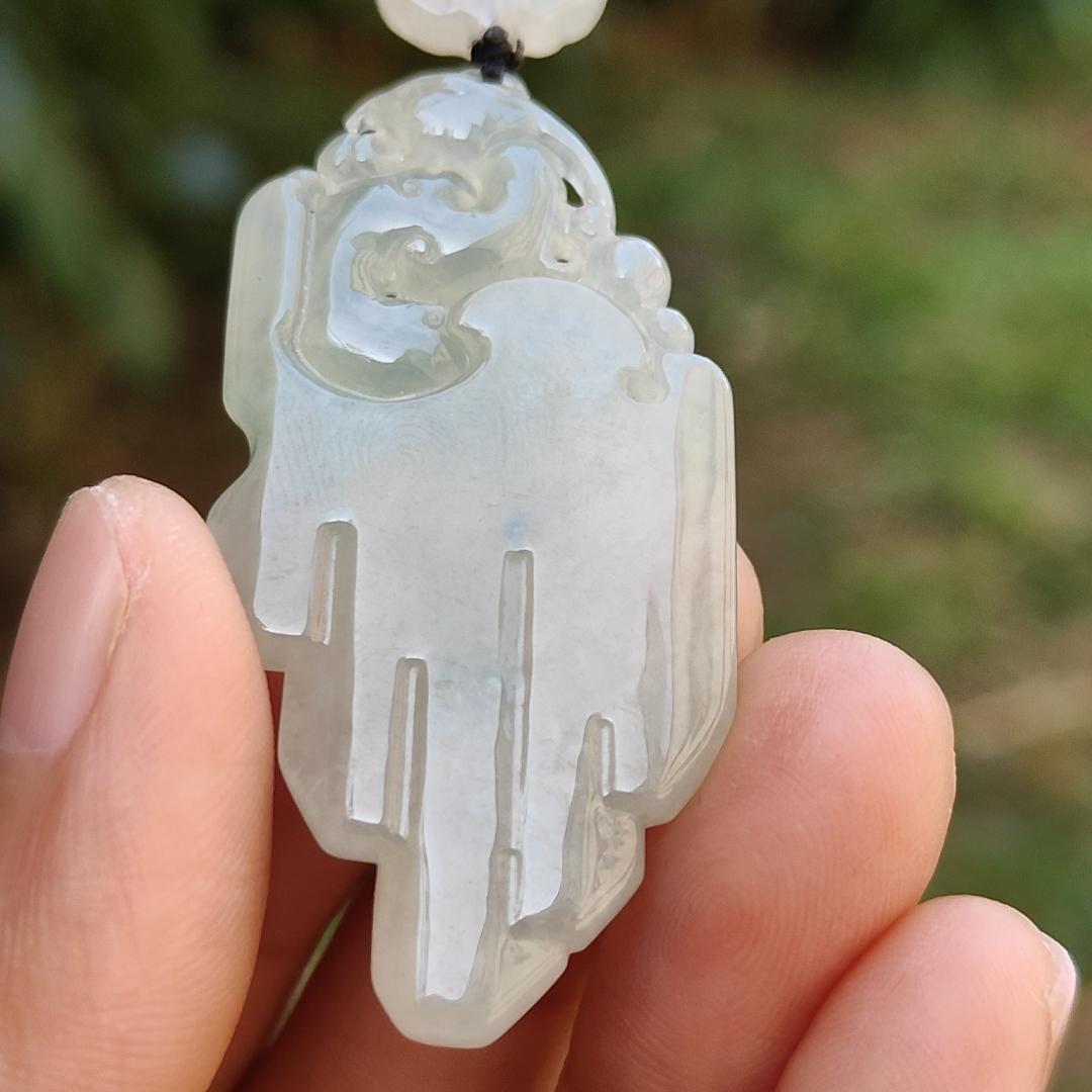 Icy Translucent Natural Type A Jadeite Jade beautifully crafted with old school dragon as pendant, certificate weighs 14.63 grams (pendant246)