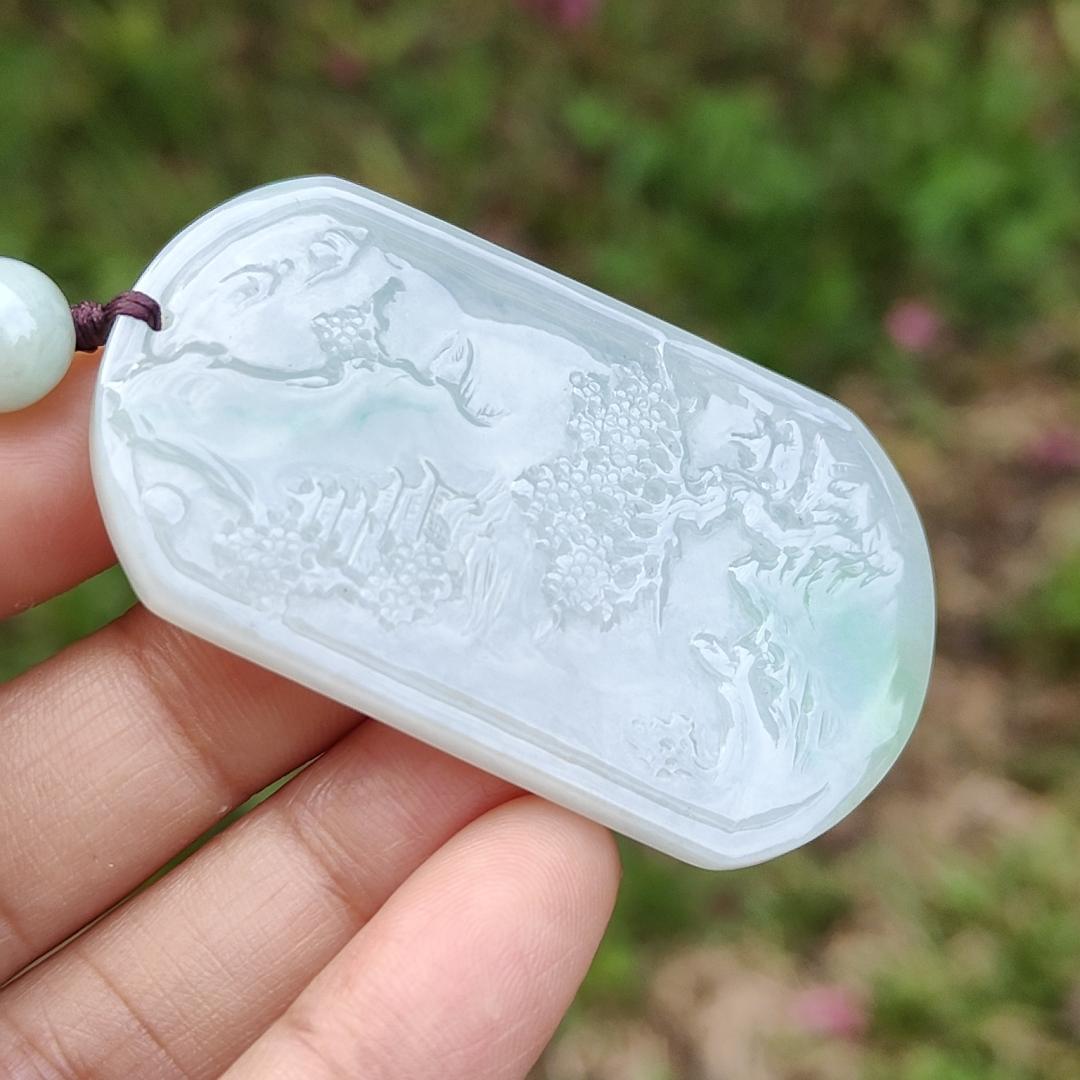 Quality Semi Icy White and Light Green Patches Natural Type A Jadeite Jade crafted with sceneries as pendant with QIC labs approved certificate weigh 24.89 grams, measurement 54 * 32 * 4.5 mm (pendant227)