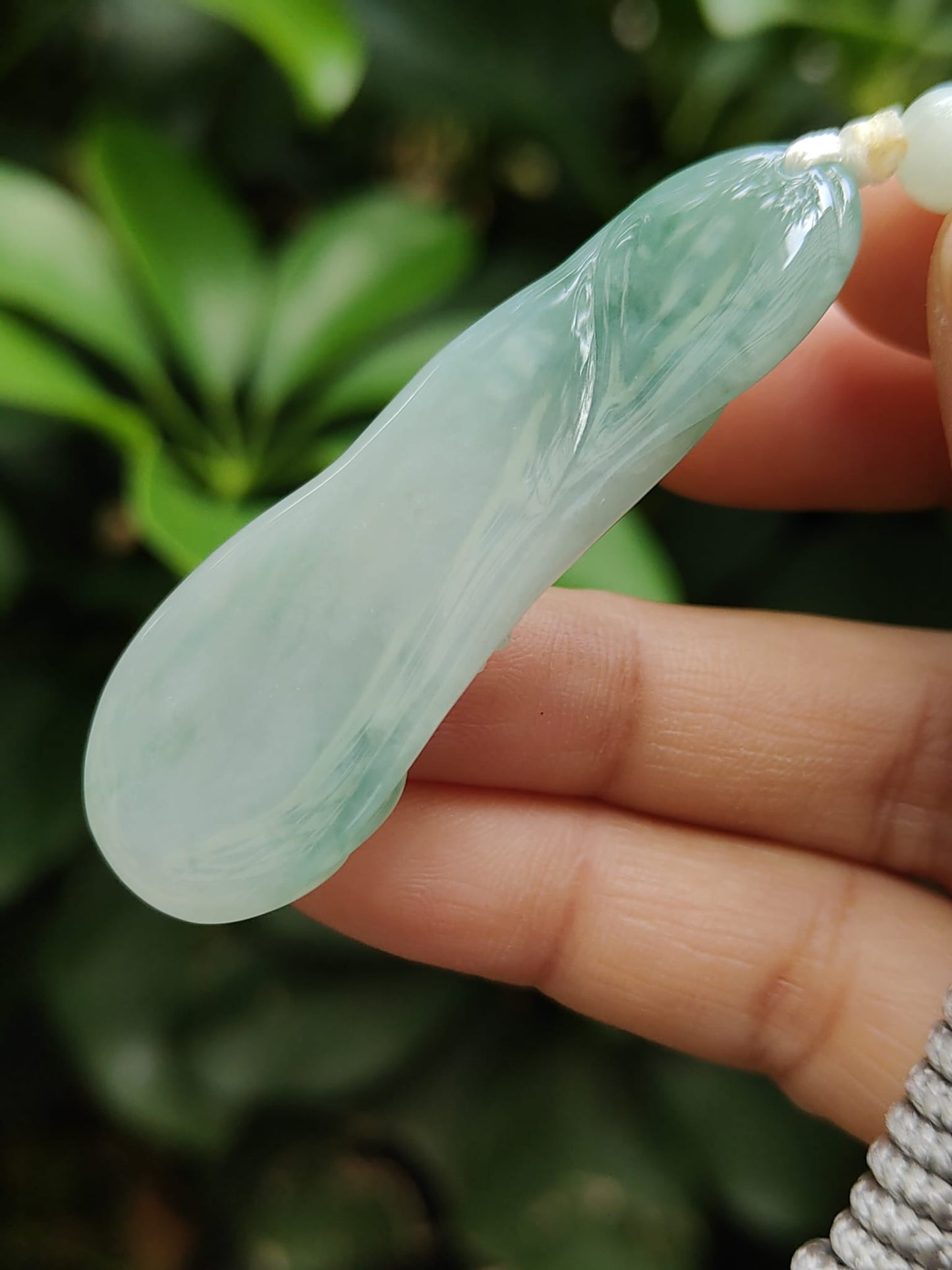 Good Quality Beautiful Natural Type A Jadeite Jade Light Green with Green Hue crafted with Dragon as Pendant, QIC labs approved certificated weigh 15.74 grams, measurements 56 * 20.5 * 6.2 mm (pendant296)