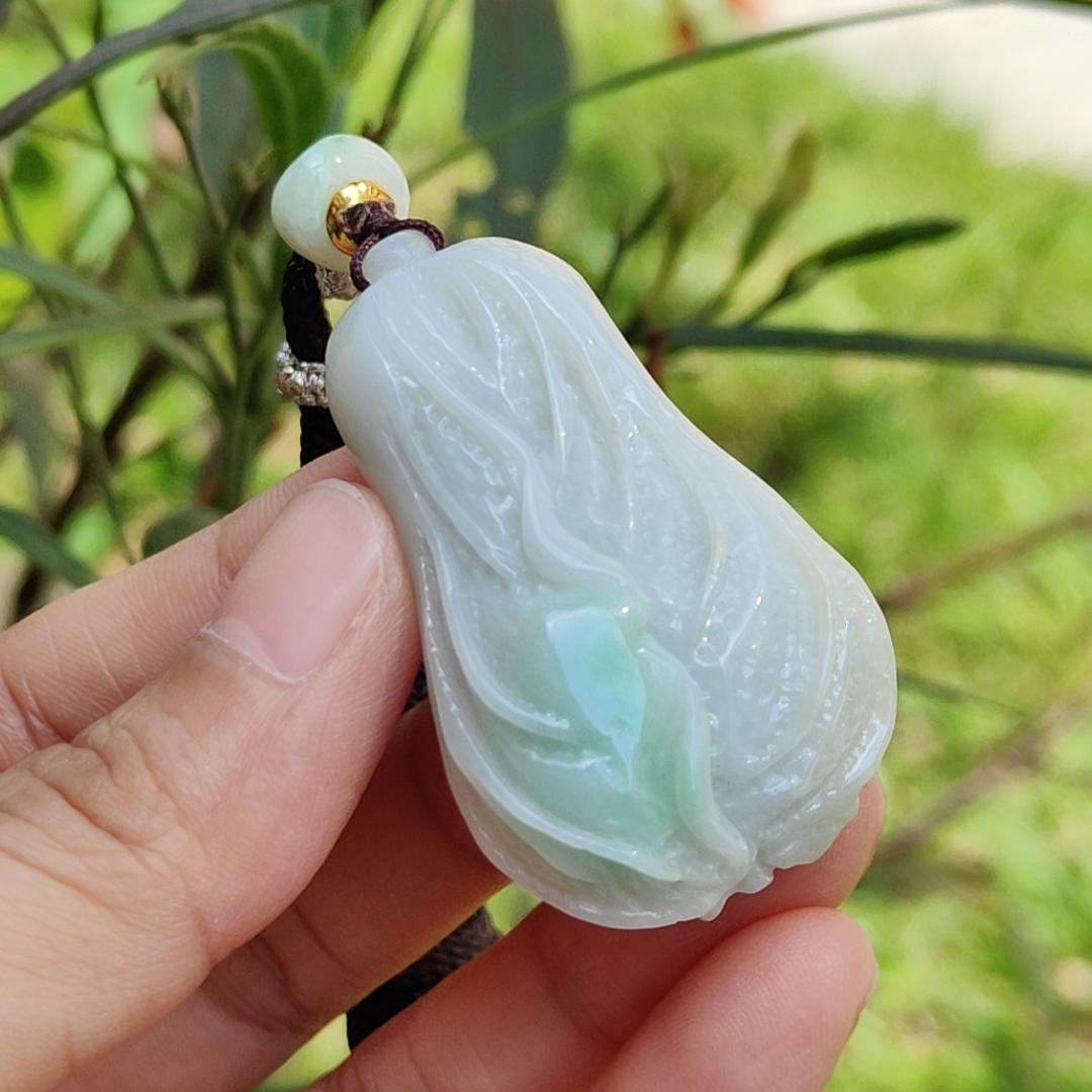 Crafted as Chinese cabbage with patches of light green Natural Type A Jadeite Pendant Necklace with GIC approved labs certificate weigh 31.92 grams, 46.8 * 27.3 * 18 mm, symbols of Boosts wealth, purity, and good weather, suitable for daily wear