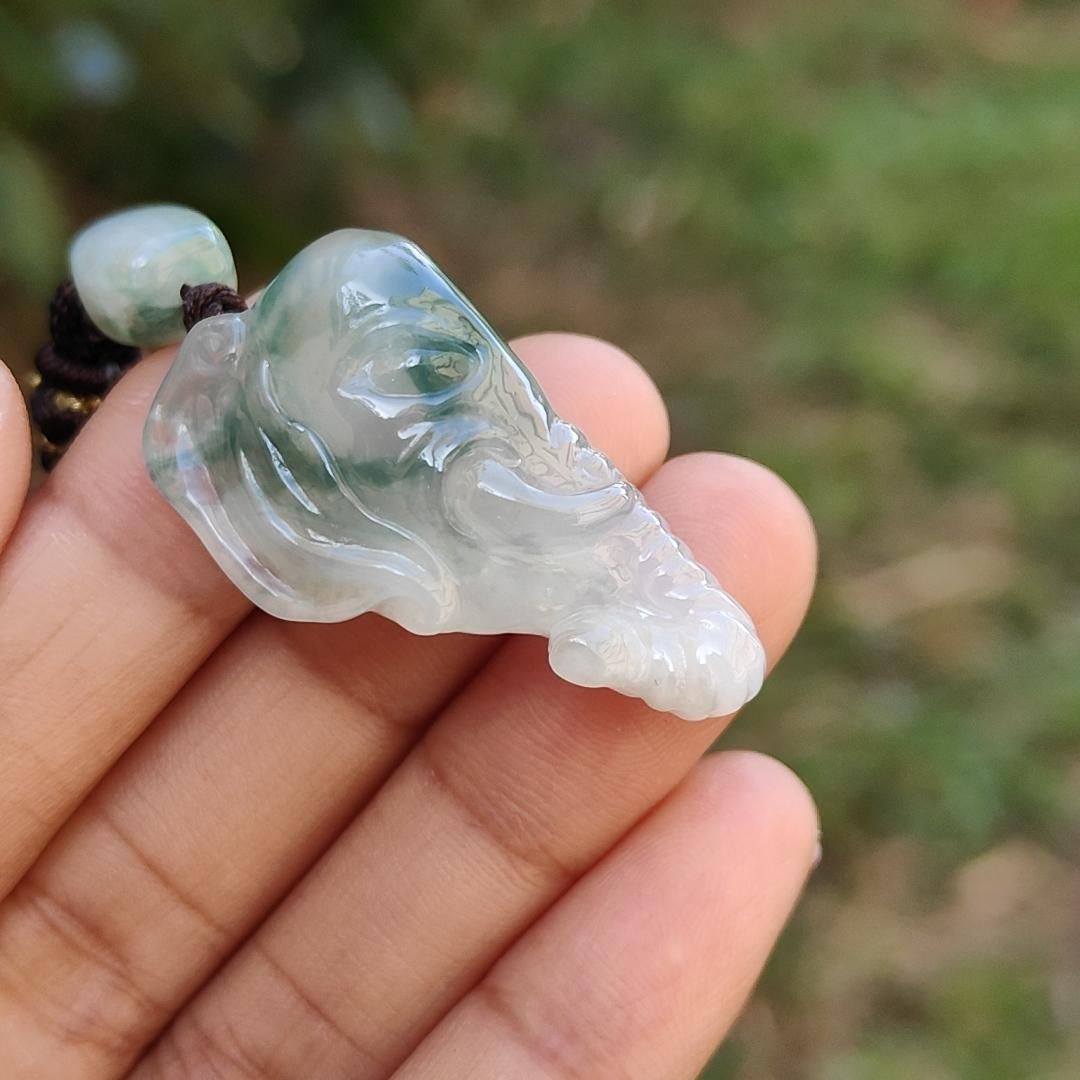 Very Rare Semi Icy Light Green Patches Natural Type A Jadeite Jade crafted with Elephant as Pendant, certificate weighs 8.63 grams, measurement 33 * 19.1 * 8.8 mm (pendant244)