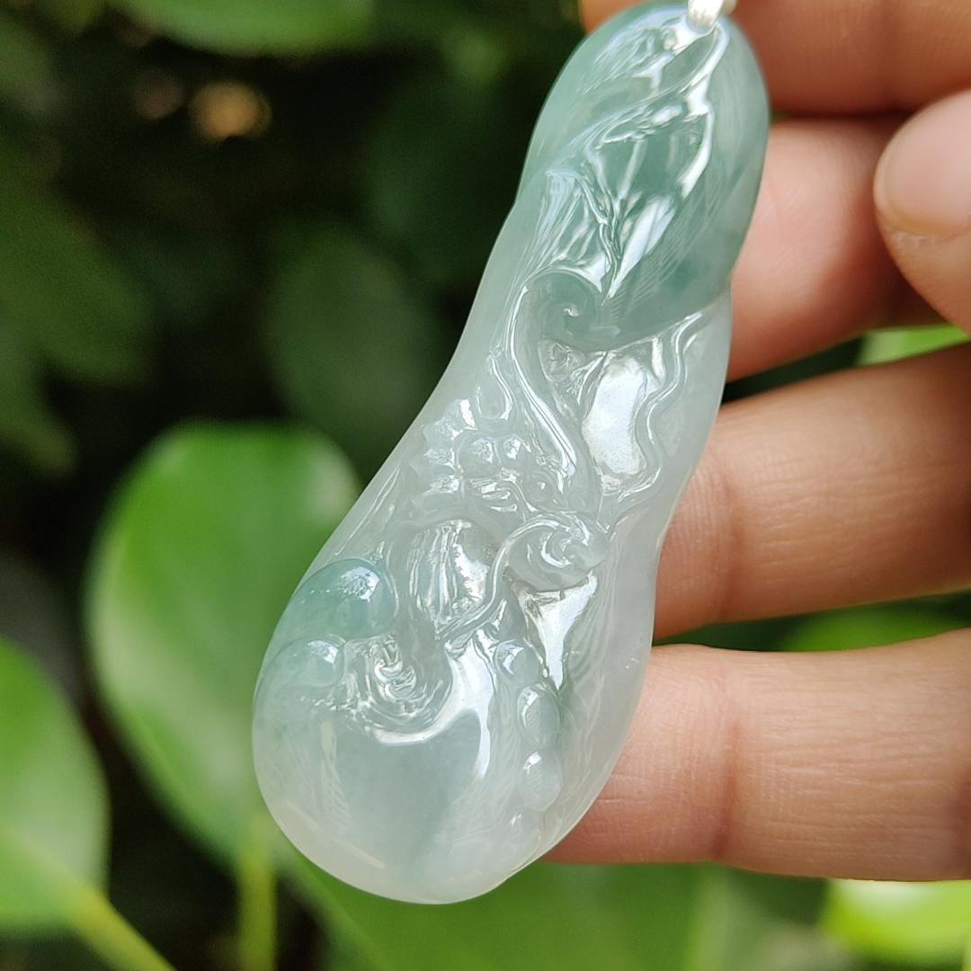 Good Quality Beautiful Natural Type A Jadeite Jade Light Green with Green Hue crafted with Dragon as Pendant, QIC labs approved certificated weigh 15.74 grams, measurements 56 * 20.5 * 6.2 mm (pendant296)