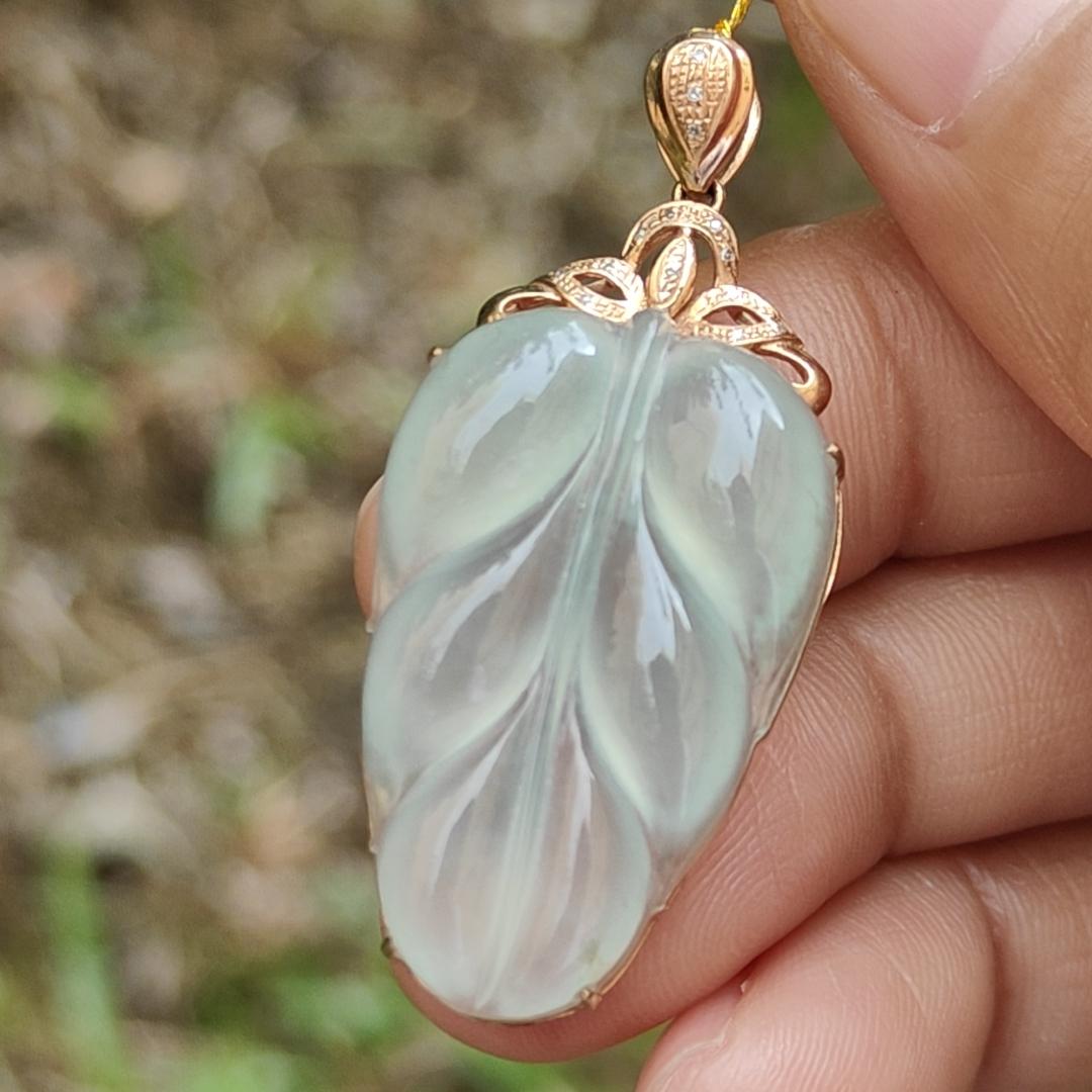 Premium Quality Icy Translucent Light Green Hue Natural Type A Jadeite Jade crafted as Leaf set on 18k Gold as Pendant, certificate weighs 5.07 grams, measurement 40.5 * 18 * 7.5 mm (18kp42)