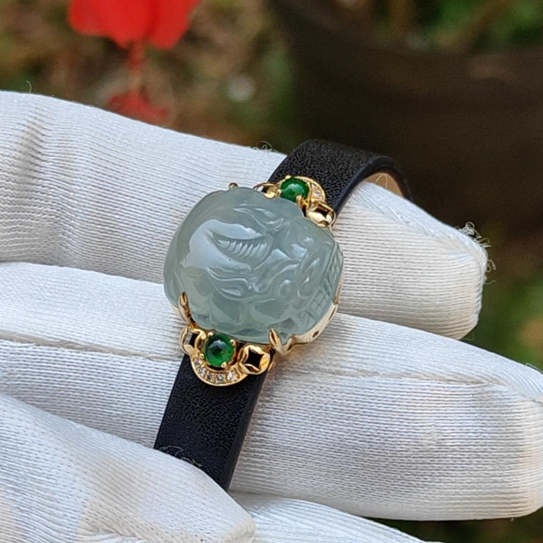 Light Green Hue Natural Type A Jadeite Jade crafted as Pixiu set on 18k Gold with 2 Green Cabochon and diamonds, adding PU wrist band upgraded elegant style bracelet, certificate weigh 4.44 grams, measurement 16.6 * 14.1 * 7.5 mm (18kpw1)