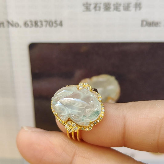 Highly Translucent Icy Variety Natural Type A Jadeite with NGI Gemstone report 18k Gold Jadeite Ring with Diamonds carved as pixiu weighs 5.01 grams , 15.23 * 11.57 * 5.60 mm , Internal Diameter Finger size = 15.2mm (18kring11)