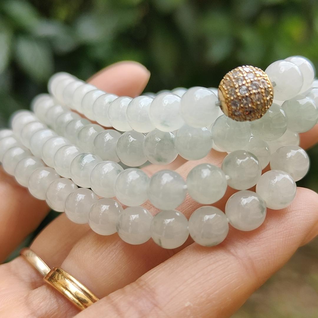 Premium Icy Translucent with Light Green patches Natural Type A Jadeite Jade crafted with 108 * 6.5 mm beads as Bracelet or Necklace, certificate weighs 52.19 grams (bracelet25)