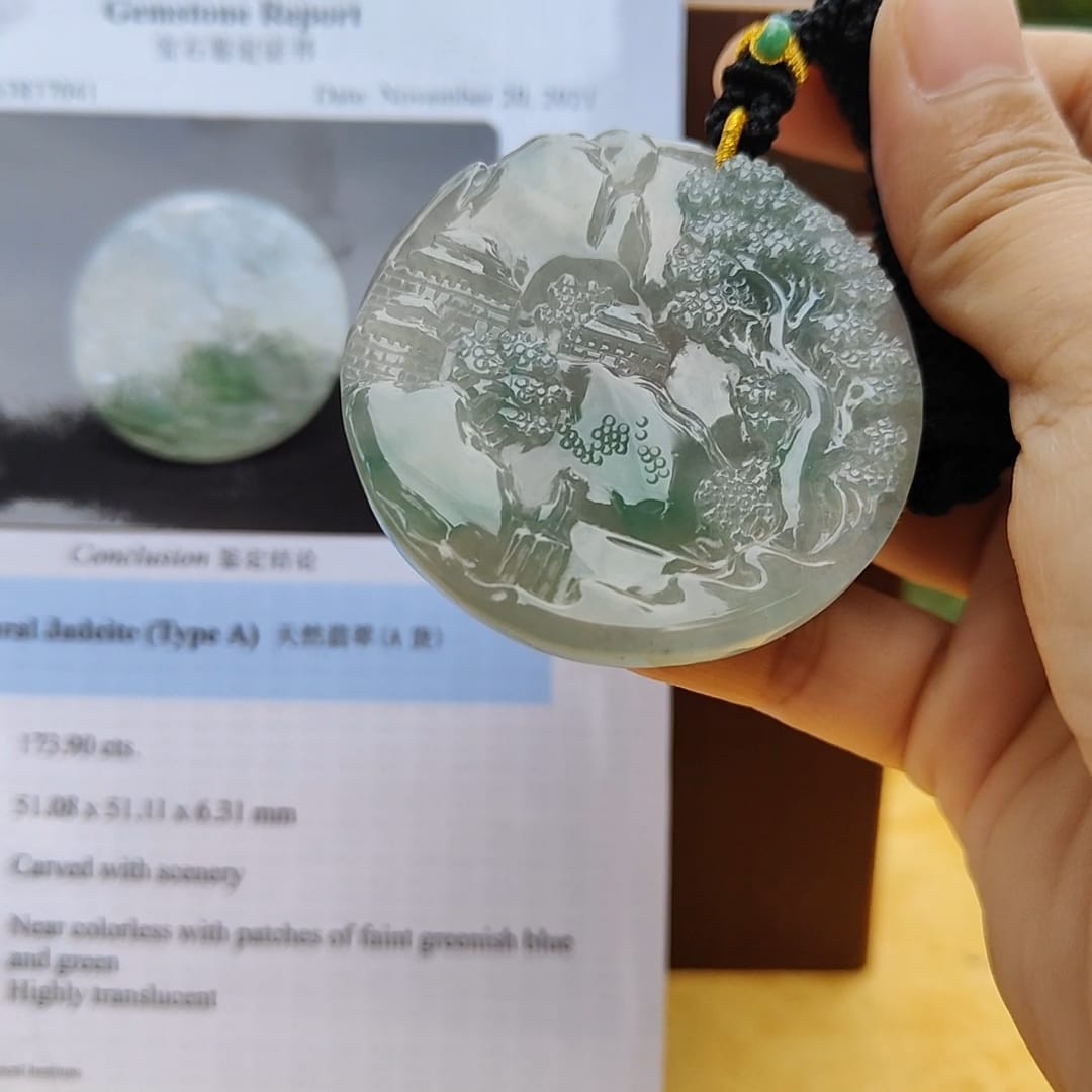 Natural Type A Jadeite carved with beautiful scenery - [51.08 * 51.11 * 6.31 mm] - Weight = 173.9 grams , premium pendant - Highly Translucent , faint greenish blue and green , NGI Certification (pendant155)