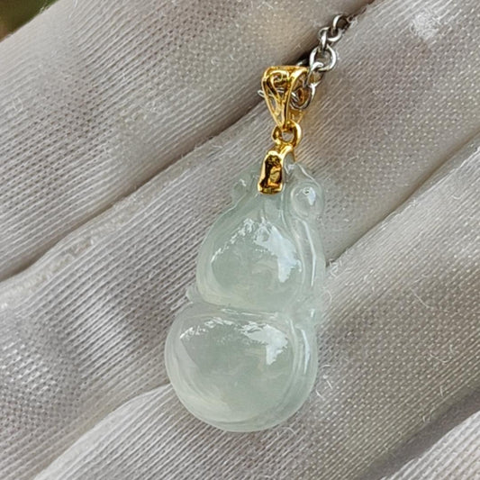 Premium Light Green Hue Natural Type A Jadeite Jade crafted with shape of Gourd as Pendant set with 18k Gold Clasp, certificate weigh 2.36 grams, measurement 20.5 * 12.9 * 5.9 mm (18kp31)