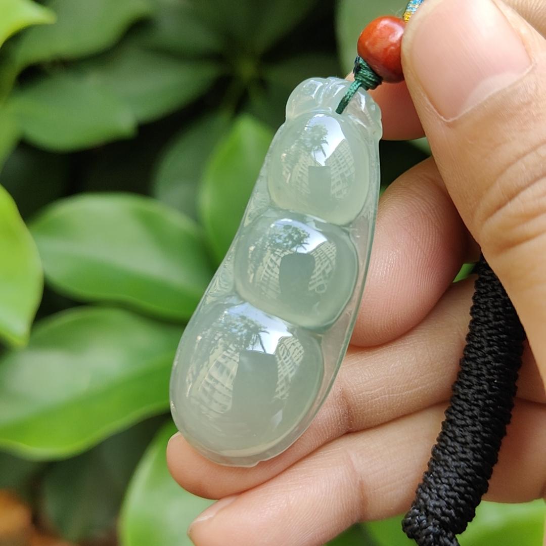 Premium Quality Icy Translucent Green Hue crafted as French Bean Natural Type A Jadeite Jade as Pendant, certificate weighs 12.37 grams, measurement 49.9 * 20 * 7.6 mm (pendant297)