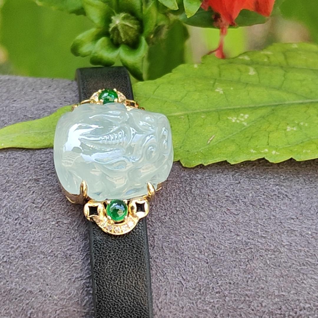 Light Green Hue Natural Type A Jadeite Jade crafted as Pixiu set on 18k Gold with 2 Green Cabochon and diamonds, adding PU wrist band upgraded elegant style bracelet, certificate weigh 4.44 grams, measurement 16.6 * 14.1 * 7.5 mm (18kpw1)