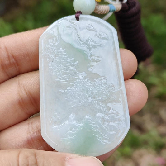 Quality Semi Icy White and Light Green Patches Natural Type A Jadeite Jade crafted with sceneries as pendant with QIC labs approved certificate weigh 24.89 grams, measurement 54 * 32 * 4.5 mm (pendant227)